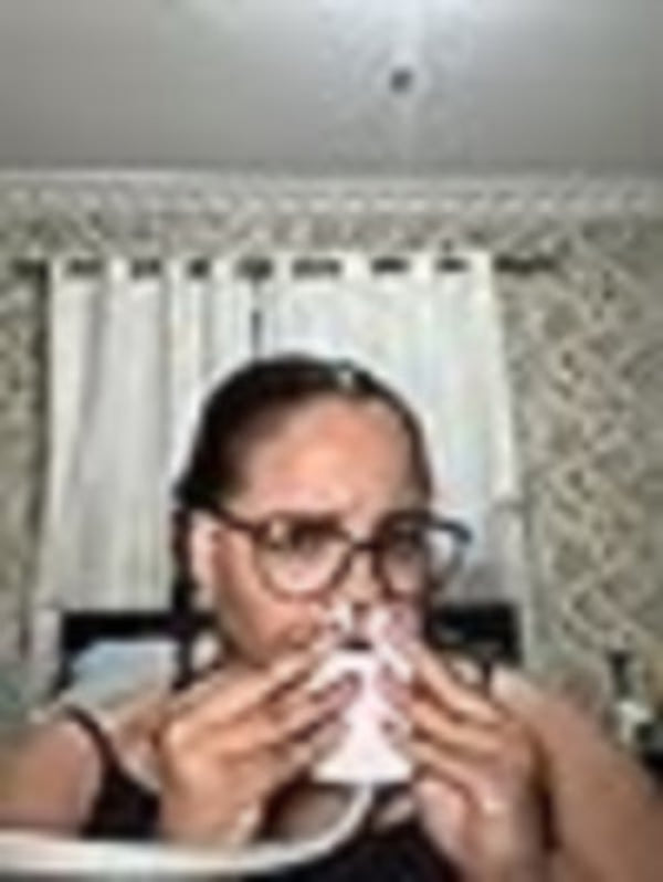 Woman holding a mug with a blurred background